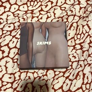 Sculpting bodysuit mid thigh mica S/M Skims